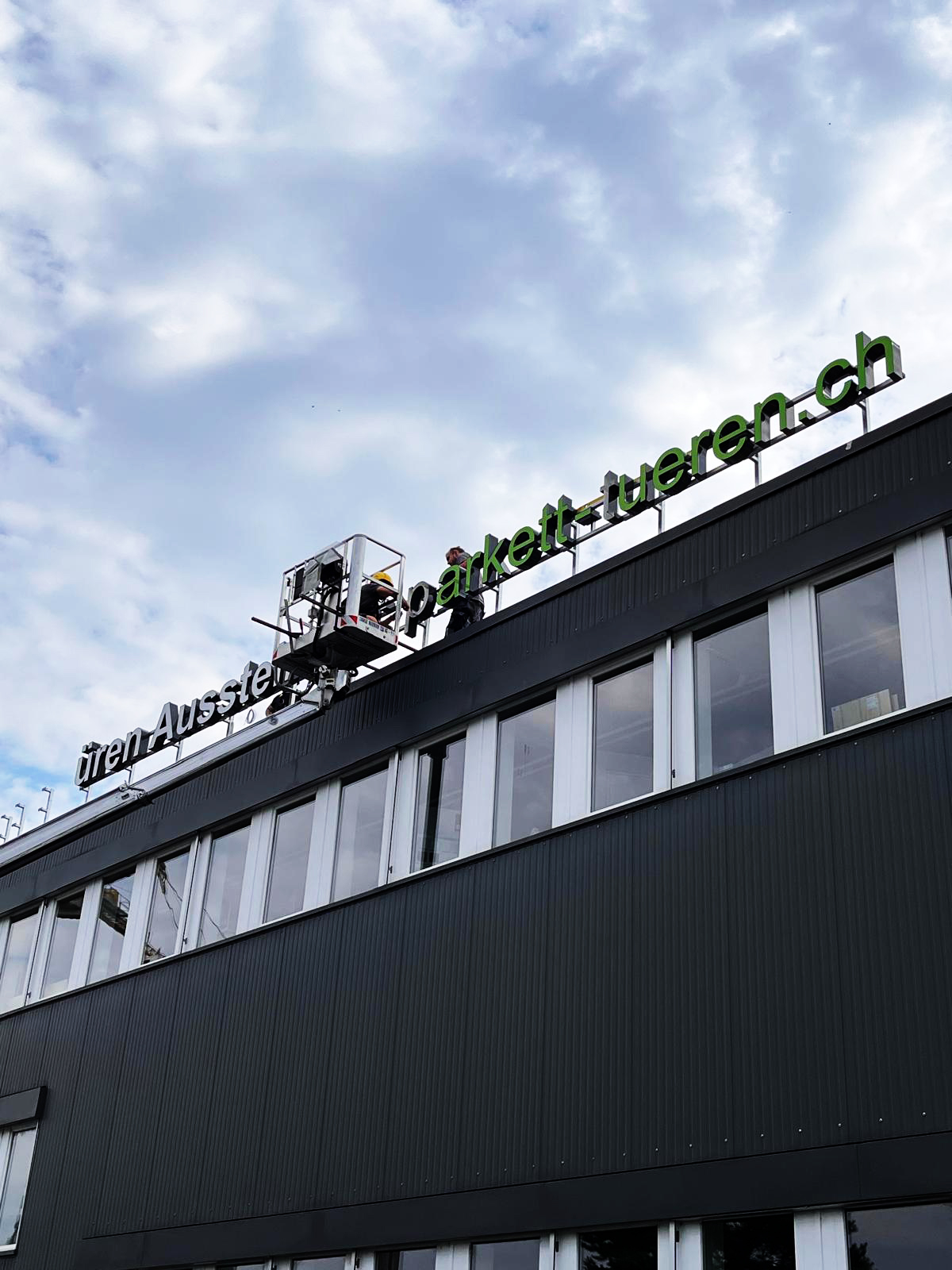 New illuminated advertising for our parquet and door exhibition Customised doors